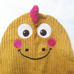 doudou peluche dinosaure dino détail visage rigolo